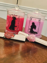 Load image into Gallery viewer, A duo of custom candles inspired by Final Fantasy 14 characters Azarashi and Bridgette and their matching care scrolls.
